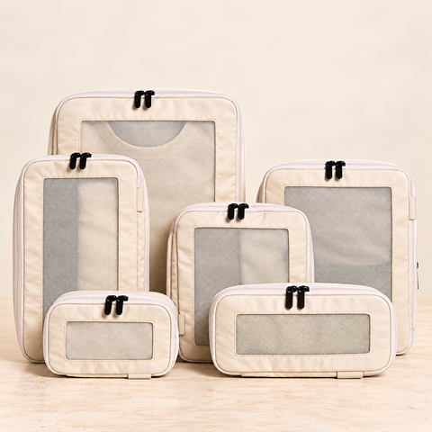 Beige six-piece compression packing cubes — full view