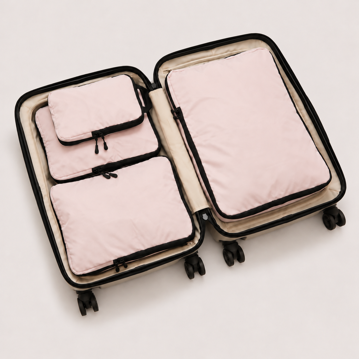 Pink compression packing cubes — colour reference showing four cubes; choose set size separately